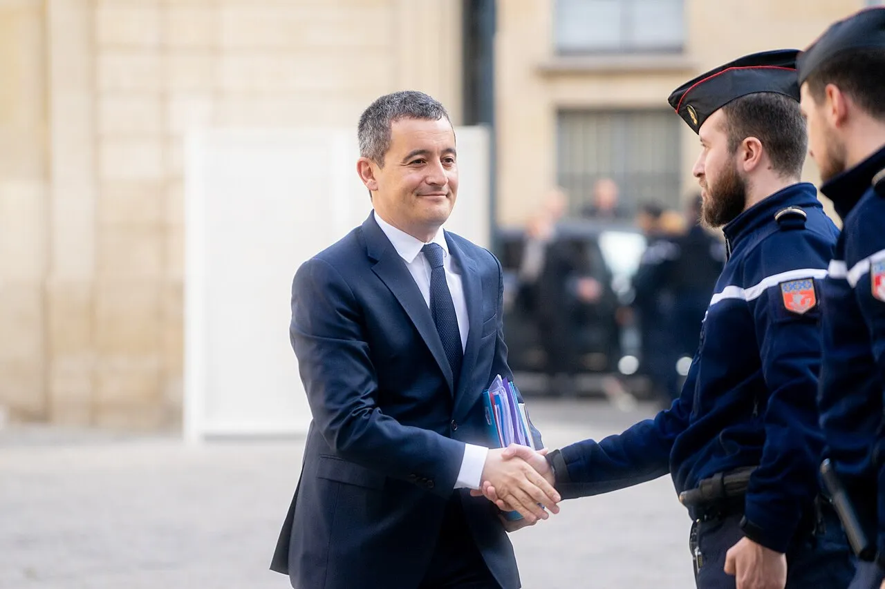 Minister van Justitie Gérald Darmanin tijdens een publiek optreden.